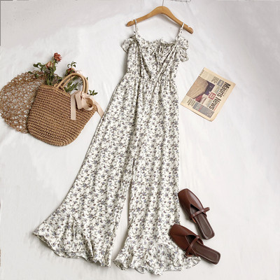 Salopetă elegantă de damă cu model floral și bretele subțiri