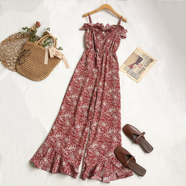 Salopetă elegantă de damă cu model floral și bretele subțiri