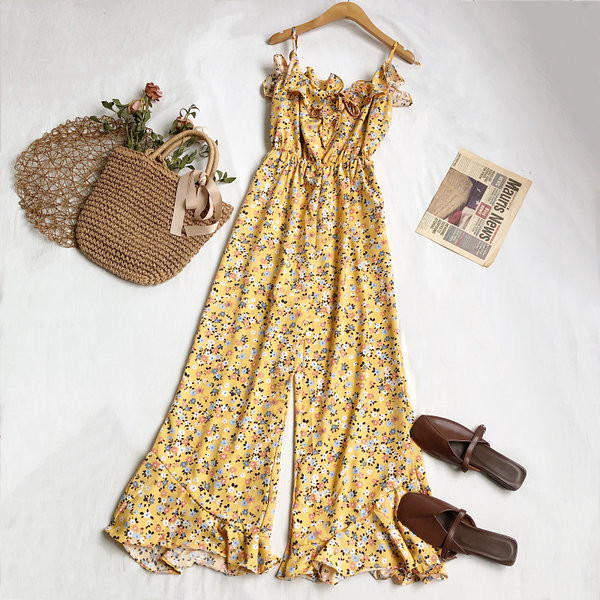 Salopetă elegantă de damă cu model floral și bretele subțiri