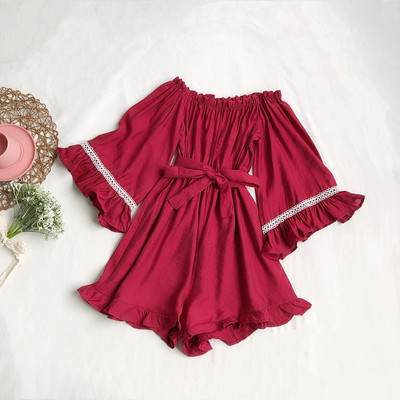 Ženski moderni kombinezon s 3/4 rukavima i remenom oko struka