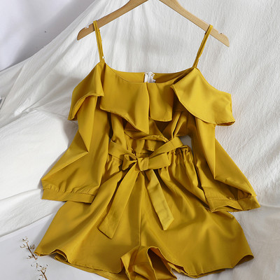 Salopetă modernă de damă cu bretele subțiri și curea