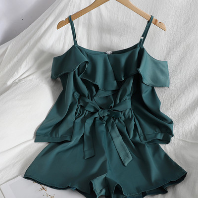 Salopetă modernă de damă cu bretele subțiri și curea