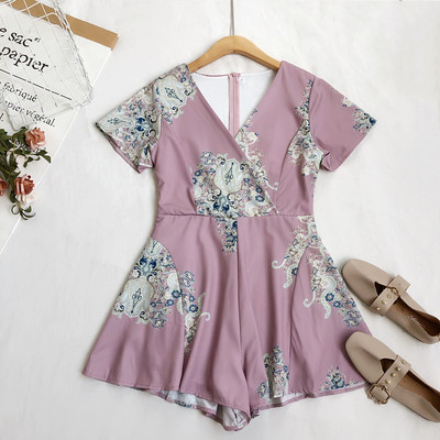 Salopetă casual de damă cu fermoar și decolteu spitz