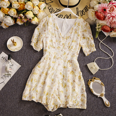 Salopetă de damă florală cu decolteu spitz