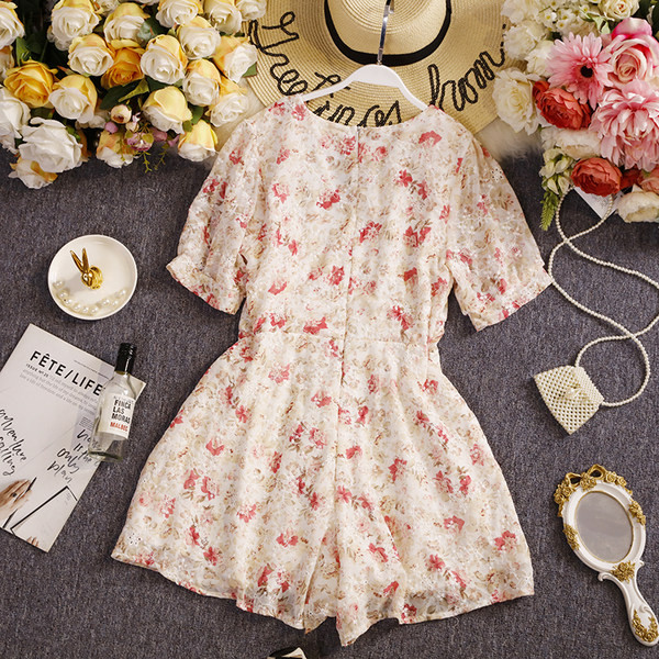 Salopetă de damă florală cu decolteu spitz