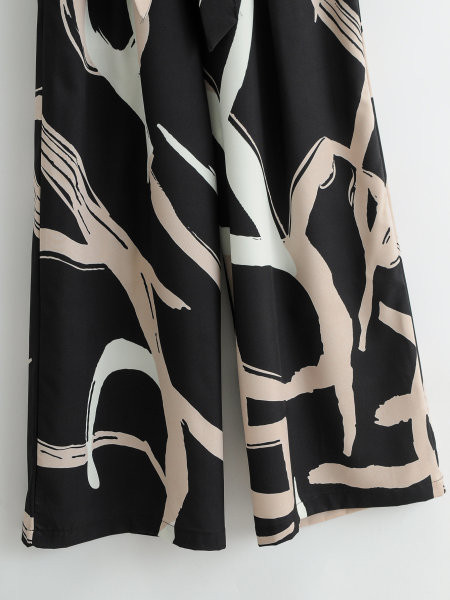 Salopetă lungă casual în negru și curea în talie