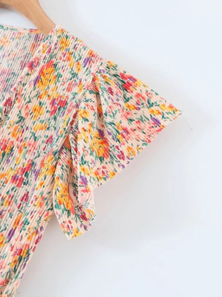 Model nou de salopetă de vară cu decolteu în V adânc și curea