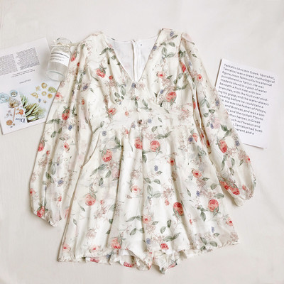 Salopetă modernă de damă cu fermoar pe spate și decolteu spitz