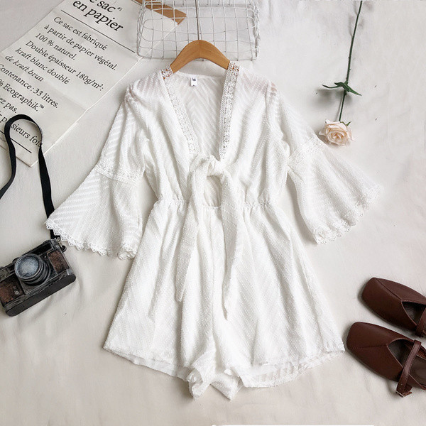 Model nou de salopetă de damă cu decolteu adânc și mâneci 3/4