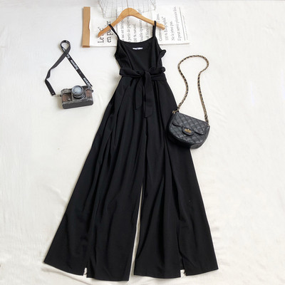 Salopetă lungă de damă cu picioare largi și bretele subțiri