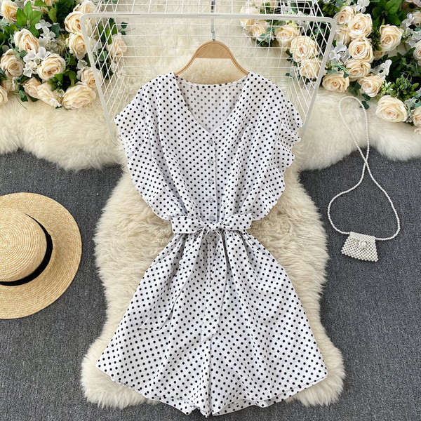 Salopetă de damă cu buline cu curea și decolteu spitz