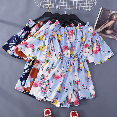 Colorful women`s overalls with floral pattern and 3/4 sleeves