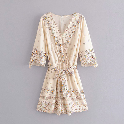 Salopetă de damă asimetrică cu legături în talie