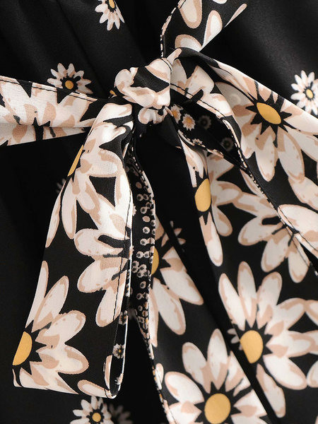 Salopetă de damă asimetrică cu legături în talie