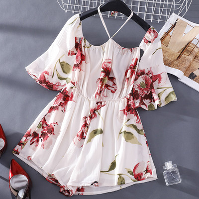 Γυναικεία κοντή ολόσωμη φόρμα με λουλουδάτο μοτίβο και μανίκια λωτού