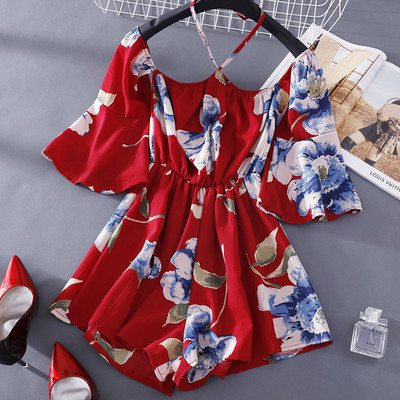 Γυναικεία κοντή ολόσωμη φόρμα με λουλουδάτο μοτίβο και μανίκια λωτού