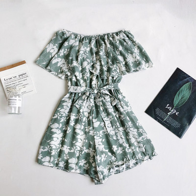 Ženski kombinezon s trakom i golim ramenima