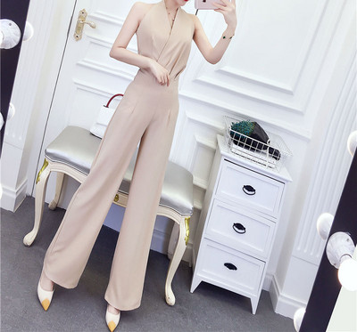 Salopetă lungă de damă cu talie înaltă și decolteu spitz