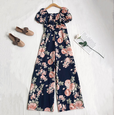 Γυναικεία μακρυμάνικη ολόσωμη φόρμα με λουλουδάτο μοτίβο και κοντά μανίκια