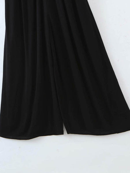 Salopetă lungă cu picioare largi și nasturi