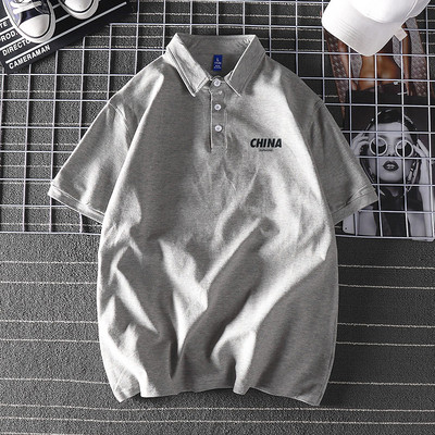 Bluză model larg cu mâneci scurte și inscripție