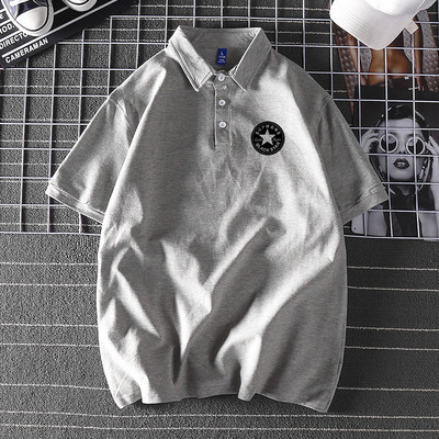 Bluză model larg cu mâneci scurte și inscripție