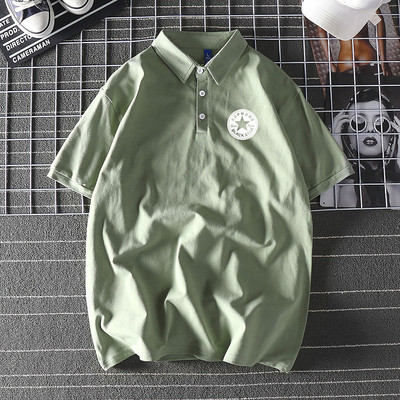 Bluză model larg cu mâneci scurte și inscripție