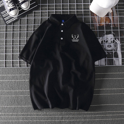 Bluză model larg cu mâneci scurte și inscripție