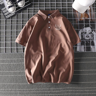 Bluză model larg cu mâneci scurte și inscripție