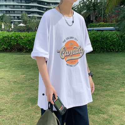 Proljetno-ljetna majica s gumbima i aplikacijama u boji