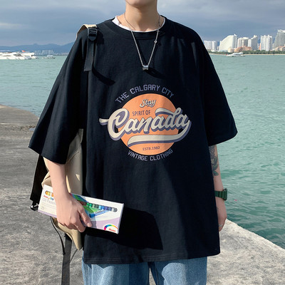 Proljetno-ljetna majica s gumbima i aplikacijama u boji