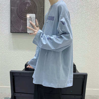 Bluză model larg cu mâneci lungi și aplicații