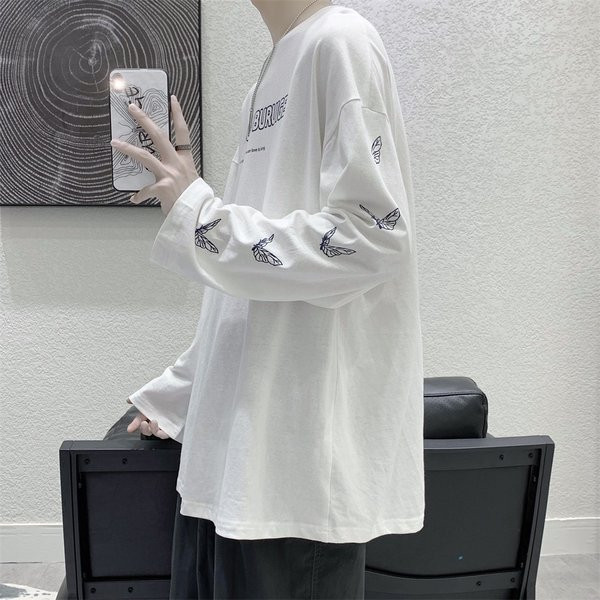 Bluză model larg cu mâneci lungi și aplicații