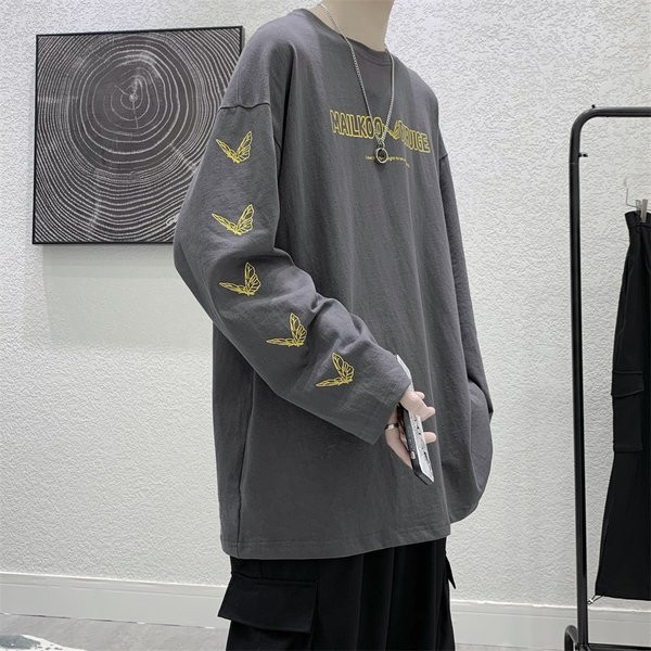 Bluză model larg cu mâneci lungi și aplicații