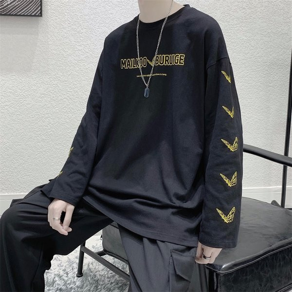 Bluză model larg cu mâneci lungi și aplicații