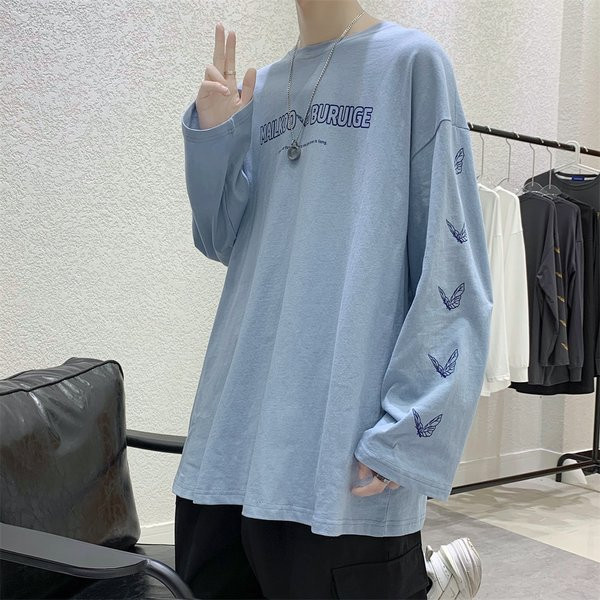 Bluză model larg cu mâneci lungi și aplicații