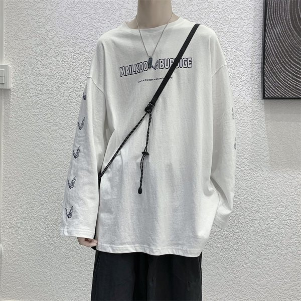 Bluză model larg cu mâneci lungi și aplicații