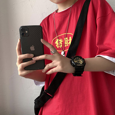 Tricou barbatesc model larg cu decolteu oval si imprimeu