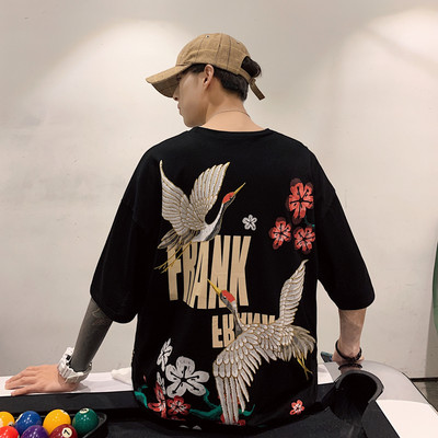 Tricou model larg cu maneci 3/4 si aplicatie pe spate