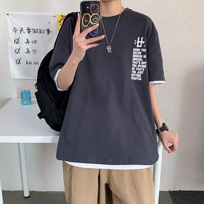 Tricou barbatesc cu decolteu rotund si imprimeu - model larg