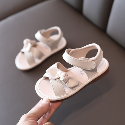 Sandale pentru copii cu talpă plată și panglică în alb și negru