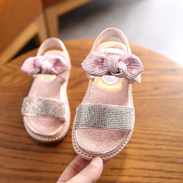 Sandale pentru copii cu talpa plate si particule lucioase si panglica