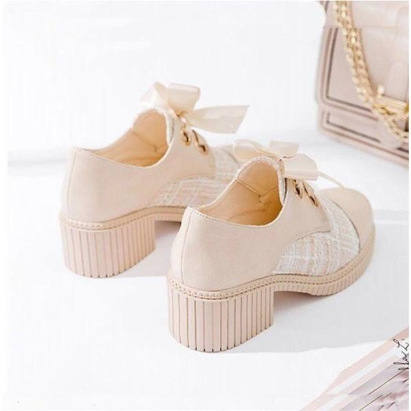 Naiste musta ja beeži värvi paeltega vabaajajalatsid