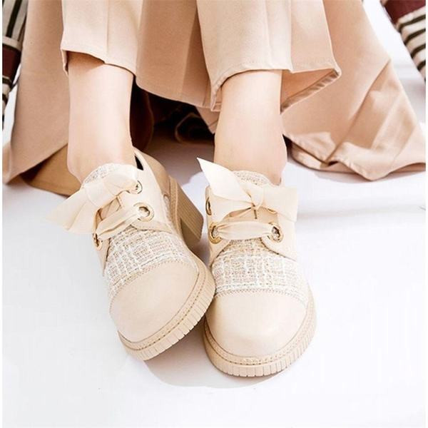 Naiste musta ja beeži värvi paeltega vabaajajalatsid