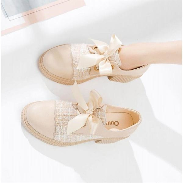 Naiste musta ja beeži värvi paeltega vabaajajalatsid