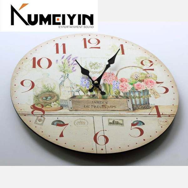 Lilledega ümmargune seinakell