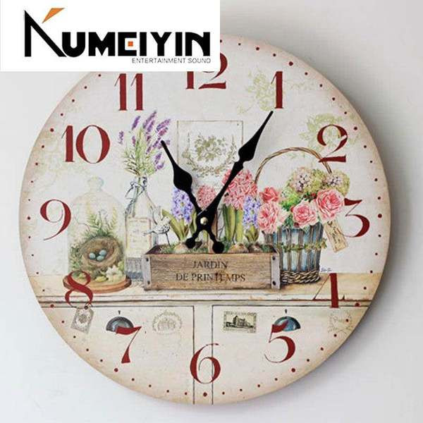 Lilledega ümmargune seinakell