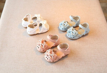 Модерни бебешки сандали с панделка и лепенка