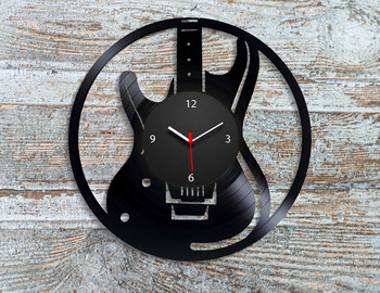 Часовник за стена с музикален инструмент в кръгла форма