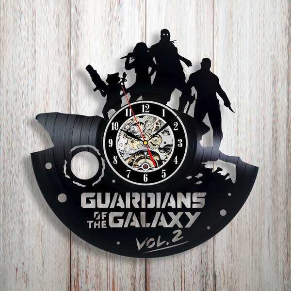 Ceas de vinil actual cu inscripție pe perete